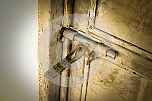 Close up:grunge metal old rusty door hinge,.