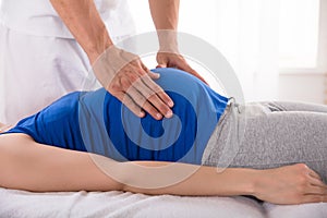 Gynaecologist Examining Pregnant Woman photo