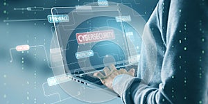 Close up of hacker hands using laptop with glowing hacking hologram with binary code and lines. Cybersecurity, firewall,