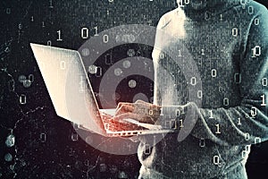 Close up of hacker hands using laptop while standing on abstract dark hacking background with bokeh circles and binary coding.