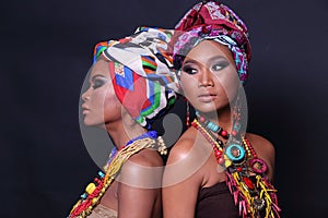 Close Up half body of 20s Asian two Woman with Fashion make up African hill Tribe style