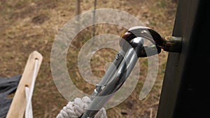 Close-up of hammock attached to carabiner hanger