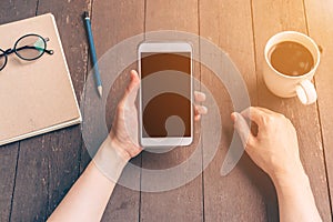 Close up hand asia woman using phone in coffee shop with vintage