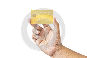 Close-up hand of Asian man holding yellow gold credit card in his hand. isolated on white background. Concept of finance, trading