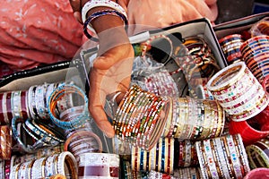 Close up of hand with bangels, Sadar Market, Jodhpur, India