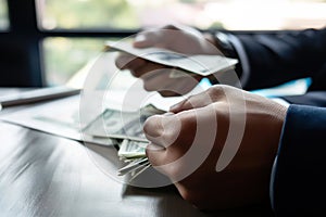 Close up hand. Business man counting money dollar on desk. Loans - personal financial insurance lifestyle real estate concept