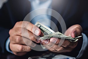 Close up hand. Business man counting money dollar on desk. Loans - personal financial insurance lifestyle real estate concept