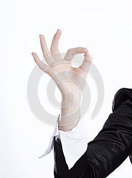 Close up. hand business woman showing gesture OK.isolated on white