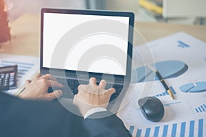 Close up hand of businessman typing laptop or notebook. Business man using computer in workplace.