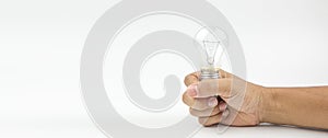Close up hand choose light bulb or lamp on white background concepts of genius create or human resources