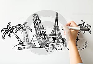 Close up of hand drawing touristic landmarks