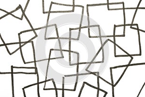 Close up of hand drawn doodle pen triangle square black lines and waves on white background