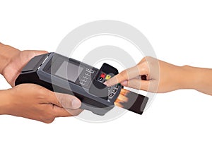 Close up of hand entering credit card pin code for security password in credit card swipe machine at point of sale terminal