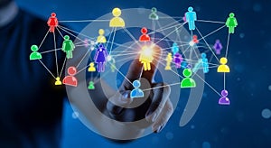 Hand touching network of colorful people icons connection