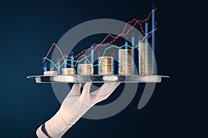 Close up of hand in glove holding tray with abstract growing stacked golden coins chart with arrows on blue background. Financial