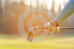 Close up hand golfer. Women player golf holding clubs for warm up and relax body before play game, copy space.