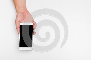 Close up hand hold phone isolated on white, mock-up smartphone white color blank screen