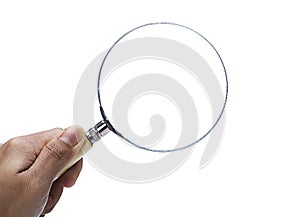 Close up of Hand holding magnifying glass