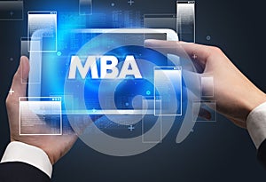 Close-up of a hand holding tablet