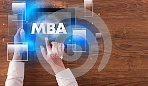 Close-up of a hand holding tablet