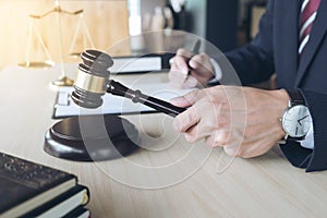 Close up of hand, Judge hitting gavel and scales of justice, Boo