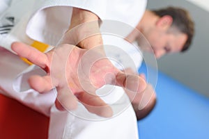 close up hand during martial arts combat