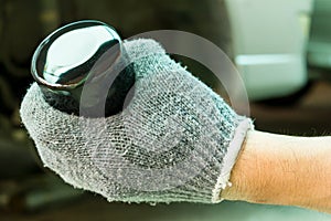 close up of Hand with New oil Filter.