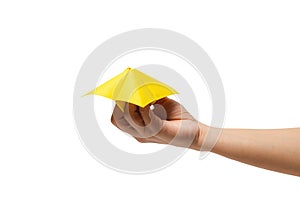 Close up of hand in a paper fortune teller  on white background