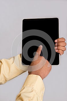 Close up of Hand Pointing to Tablet PC