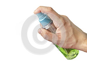 Close up of hand pressing green spray. bottle to spray. Hand sanitizer to hand with isolated white background