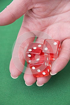 Close up of a hand throwing dices