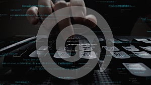 Close-up of a hand typing on a keyboard with floating code lines representing software programming and technology in a