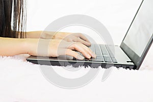 Close up hand typing on keybord