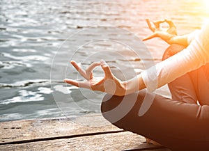 Close up hand. Woman do yoda outdoor. Woman exercising yoga