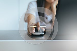 Close up of hand woman serching and click mouse using laptop