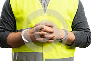 Close-up of handcuffed constructor man as criminal law concept