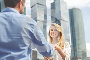 Close-up of handing over documents during business briefing