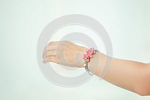 Close up. handmade bracelet on woman`s hand. photo with copy space. photo with copy space