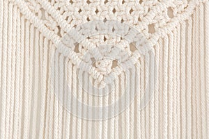 Close up of handmade macrame panel. Texture. Background.