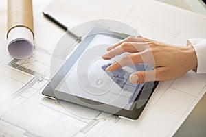 Close-up Of Hands Architect Woman Using Tablet Pc