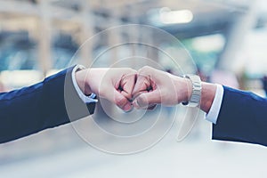 Close up hands businessman and partner working of business people join hand together and start up work.