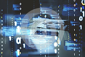 Close up of hands at desktop using computer keyboard with abstract coding binary code hologram on blurry background. Artificial