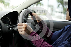 Close up of Hands Driving Car Concept