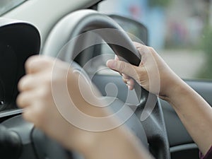 Close up of Hands Driving Car Concept