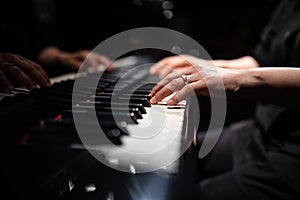 Hands of a female piano player