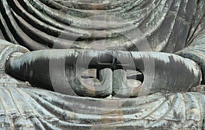 Close up of the hands of the Great Buddha in Kamakura