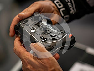Close-up of Hands Holding Game Controller