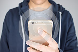 Close-up hands are holding the phones are shopping online