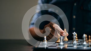 Close-up of hands playing chess. Competition Concepts and Strategies