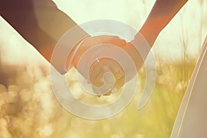 Close up of hands in shape of heart wedding just married photo